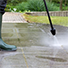 Pressure Washer Cleaning Patio